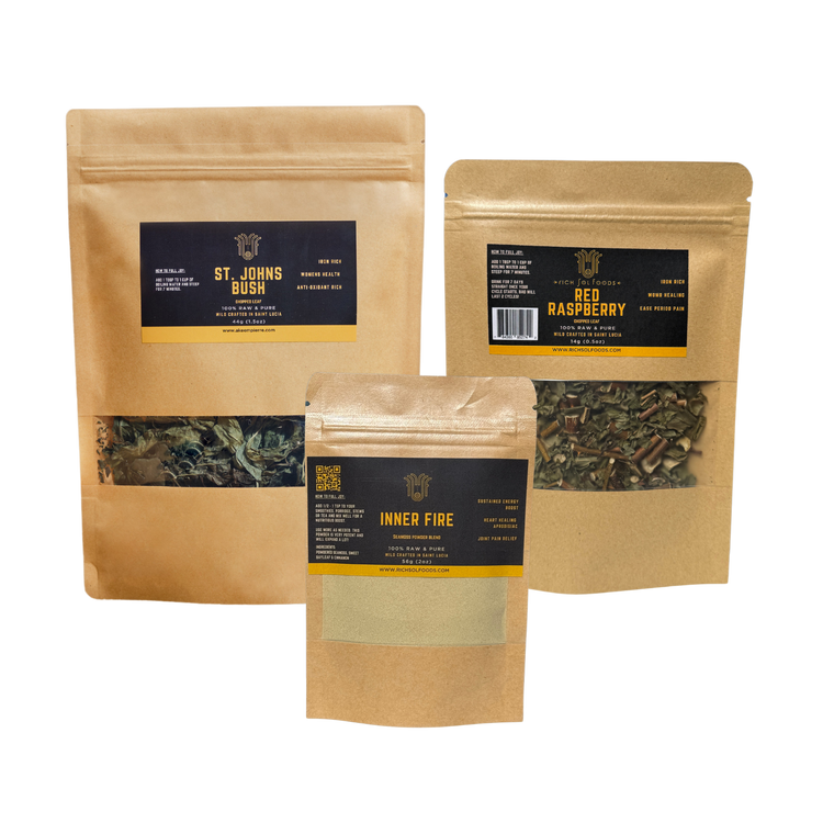 Three packages of herbal supplements, labeled as St. John's Bush, Red Raspberry, and Inner Fire Seamoss Powder Blend, with a transparent window showing the contents inside.